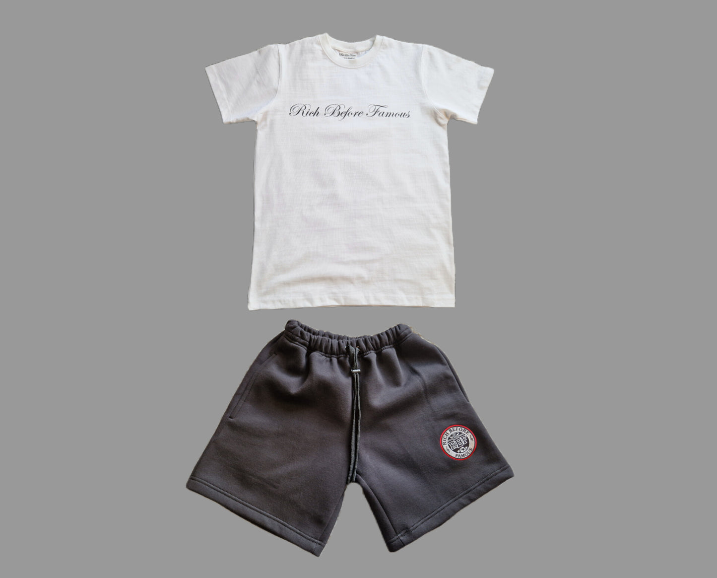 Rich Before Famous Organic cotton shorts (round logo)